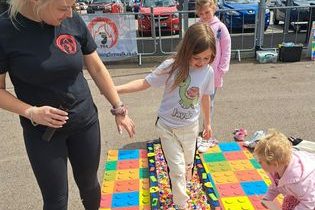 children walking on lego bricks