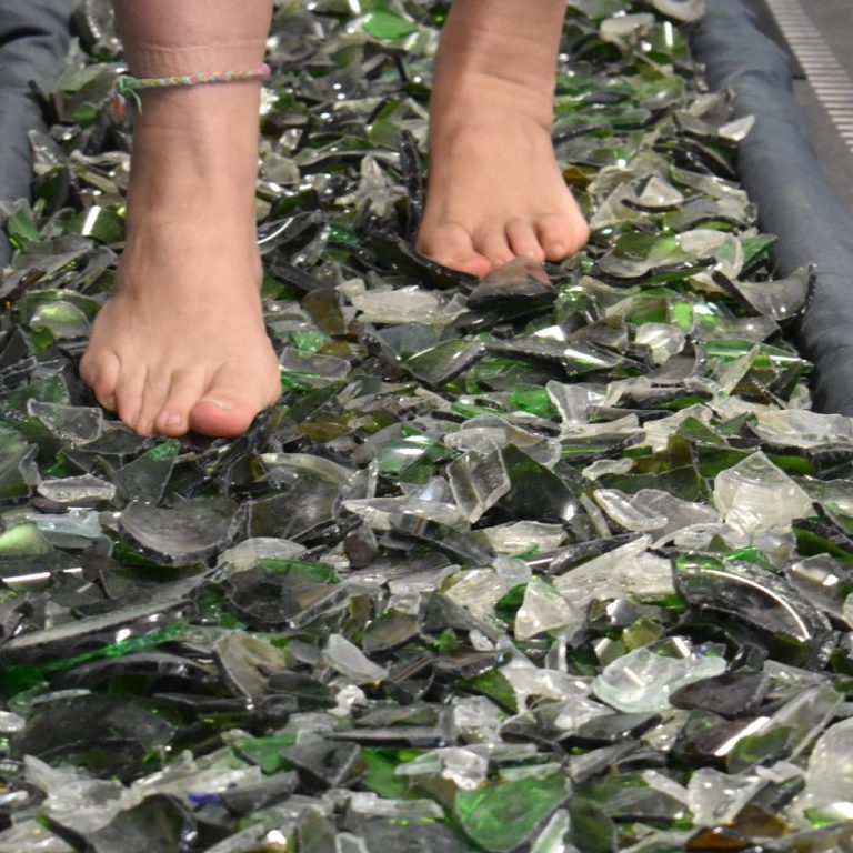 feet on broken glass